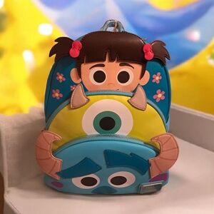 NWT Retrofacts Loungefly Disney Monsters Inc Multi Character Cos. Mini Backpack